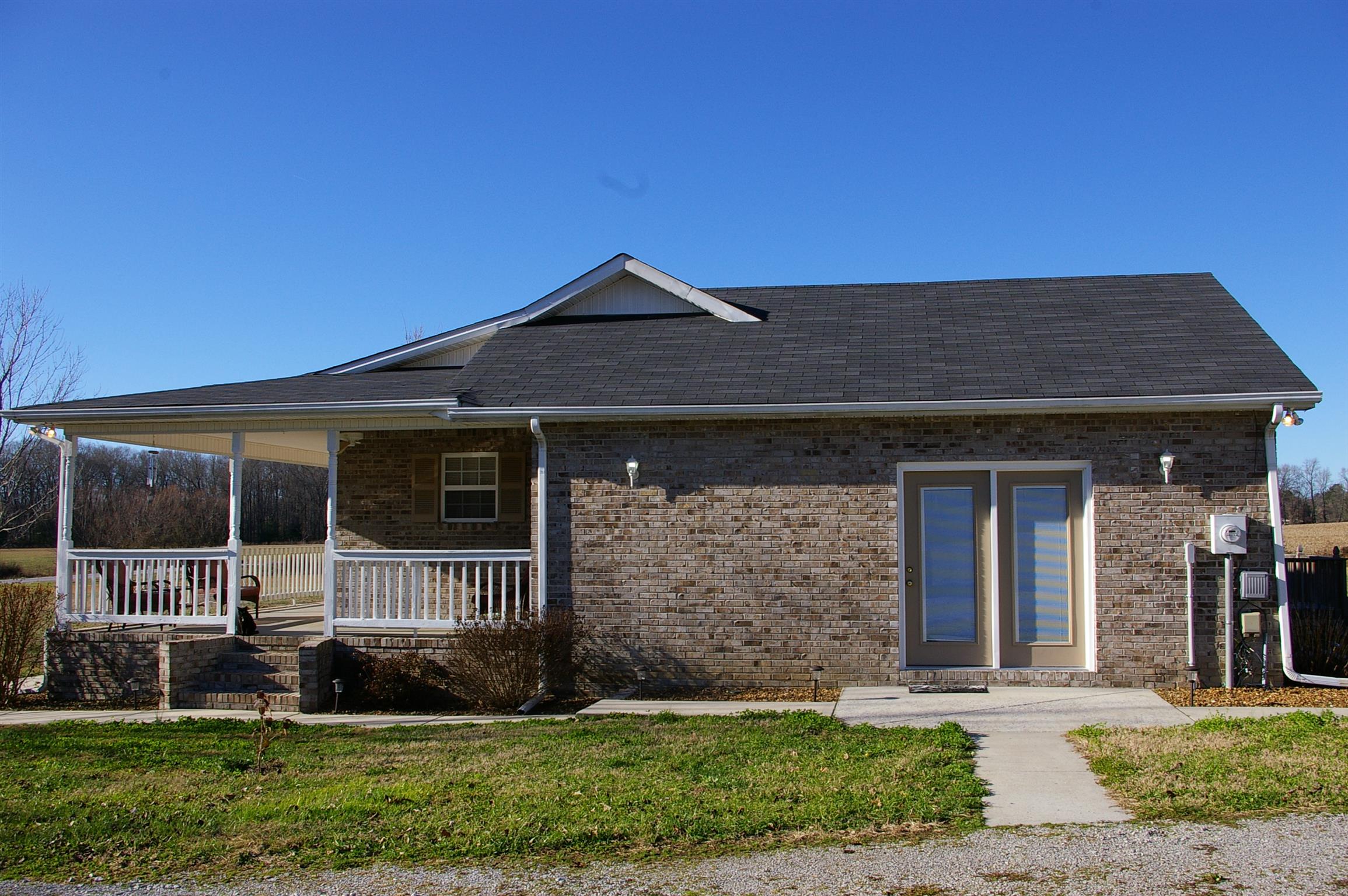 44 Old Pocahontas Road Manchester, TN 37355 - Photo 18 of 20 a front view of a house with a yard