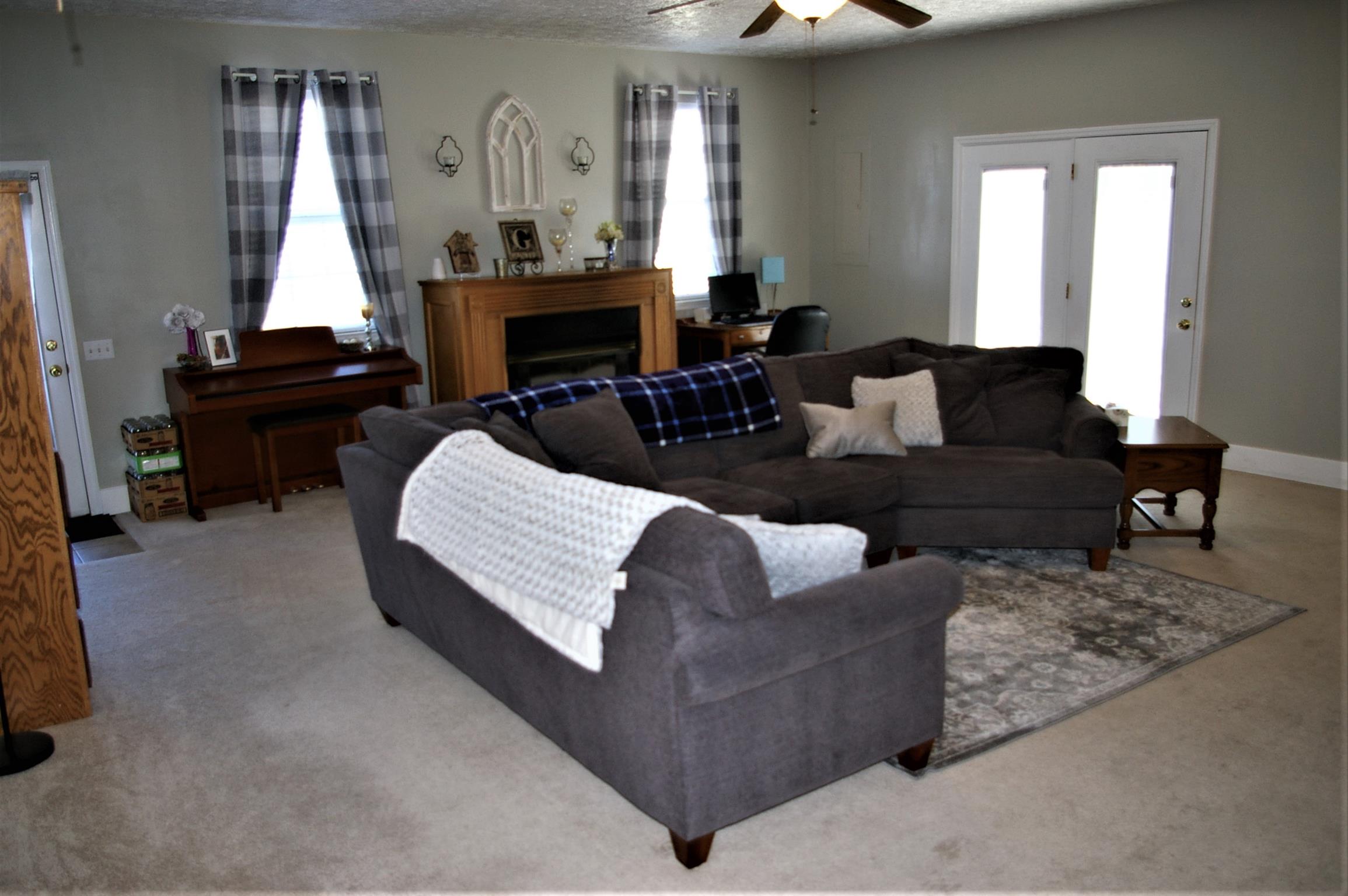 44 Old Pocahontas Road Manchester, TN 37355 - Photo 8 of 20 a living room with furniture fireplace and a window
