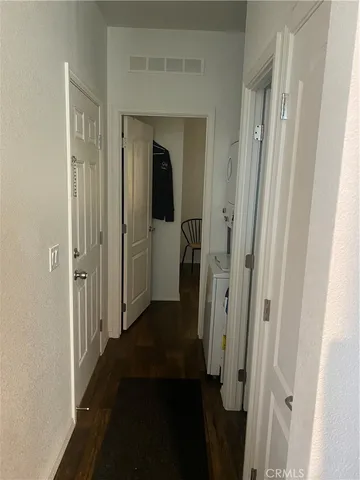 a view of a bathroom from a hallway