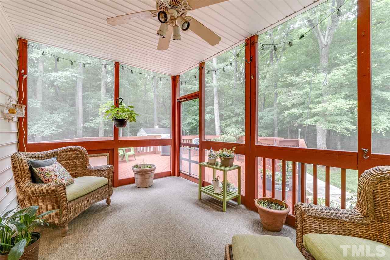 1701 Crown Glenn Place Raleigh, NC 27613 - Photo 17 of 25 a balcony with furniture and a potted plant