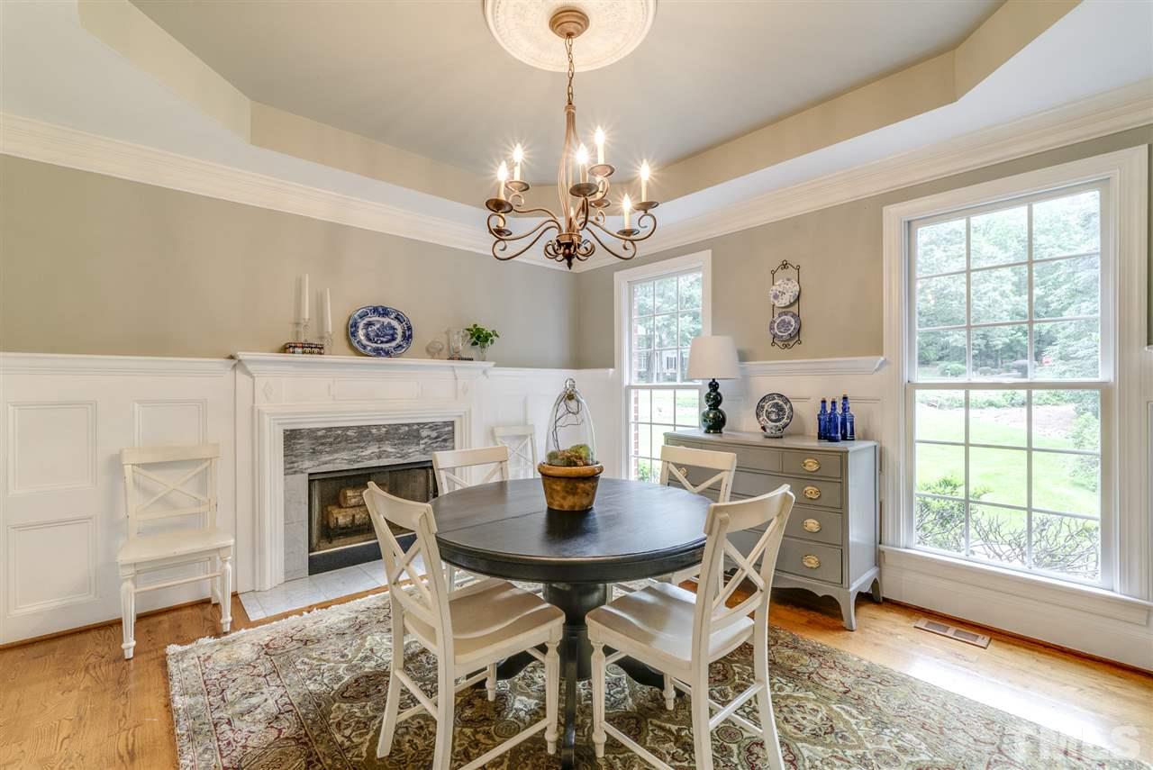 1701 Crown Glenn Place Raleigh, NC 27613 - Photo 7 of 25 a dining room with furniture and window