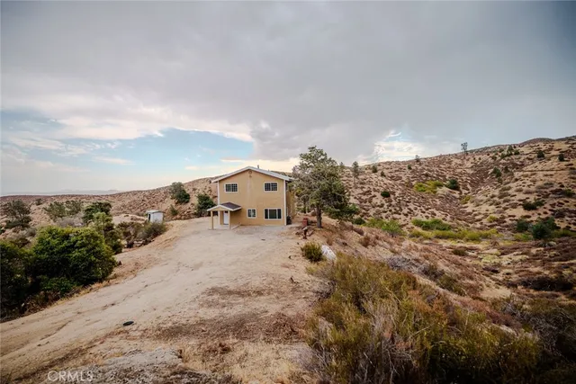 a view of a road with an ocean view