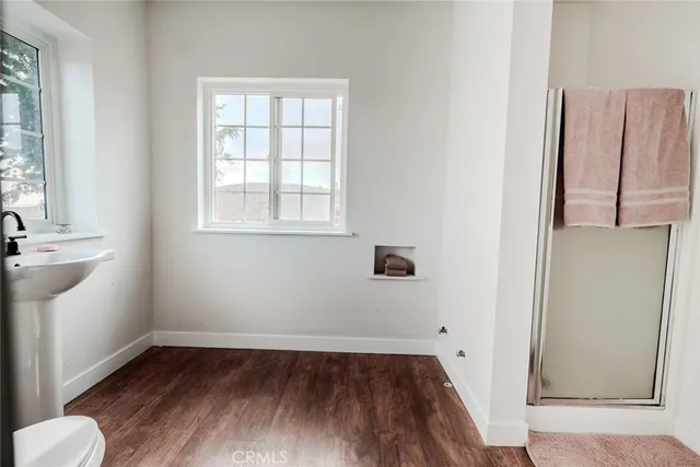 a front view of house with yard and trees