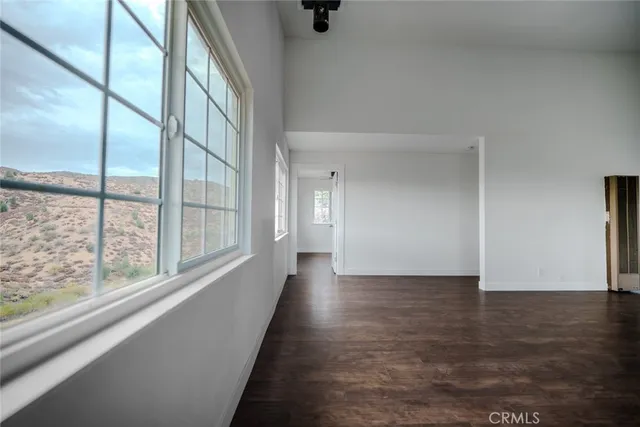 a view of a house with a snow in the yard