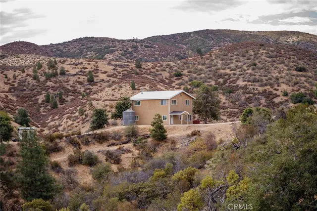 a bathroom with a sink a toilet and a shower