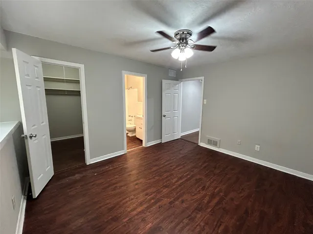 a view of an empty walk in closet