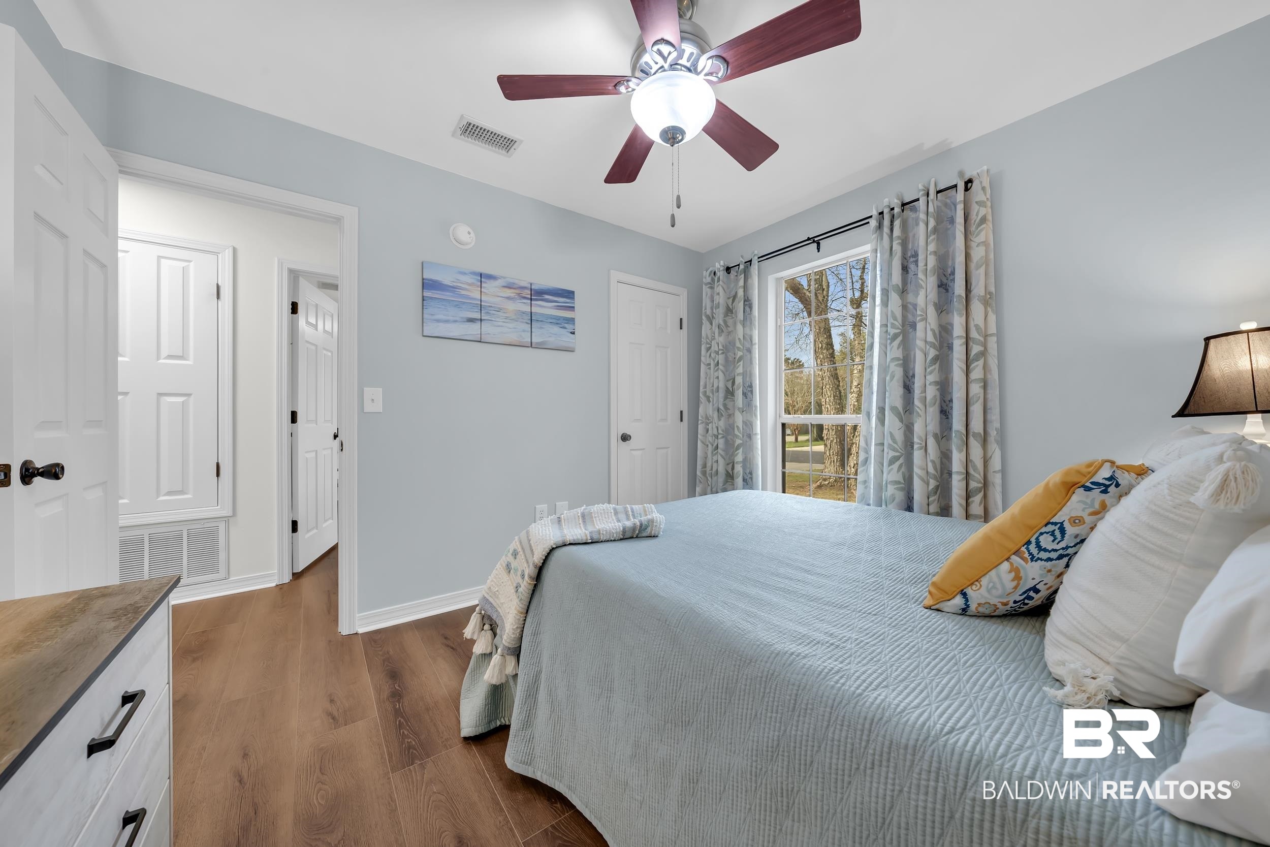 191 Robbins Boulevard Daphne, AL 36526 - Photo 14 of 24 Bedroom featuring dark wood finished floors and ceiling fan