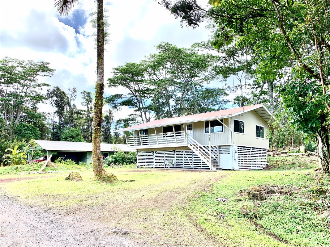 14-3404 Hawaii Road Pahoa, HI 96778 - Photo 19 of 22 a front view of a house with a yard