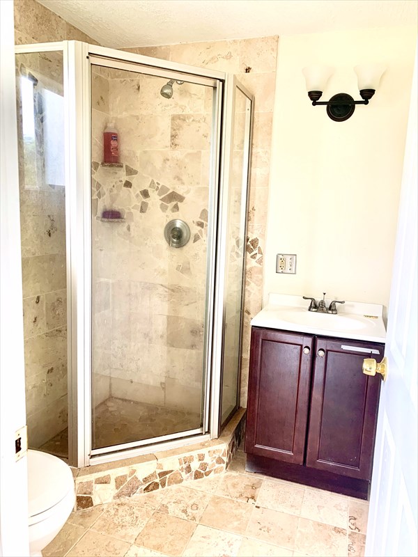 14-3404 Hawaii Road Pahoa, HI 96778 - Photo 8 of 22 a bathroom with a shower and a sink