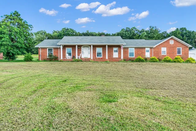 a front of a house with a yard