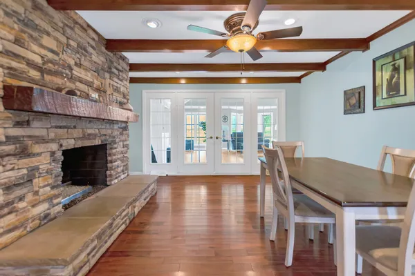 a view of a livingroom with furniture and a fireplace