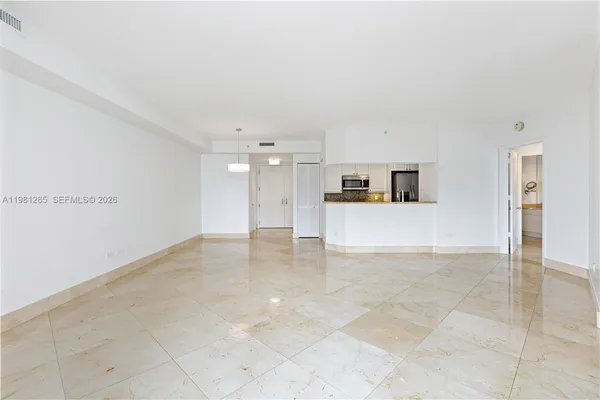 a view of a kitchen with a sink