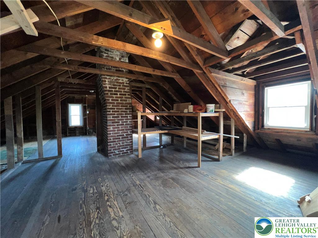 135 West Wabash Street Allentown, PA 18103 - Photo 41 of 69 a view of an empty room with wooden floor and a window
