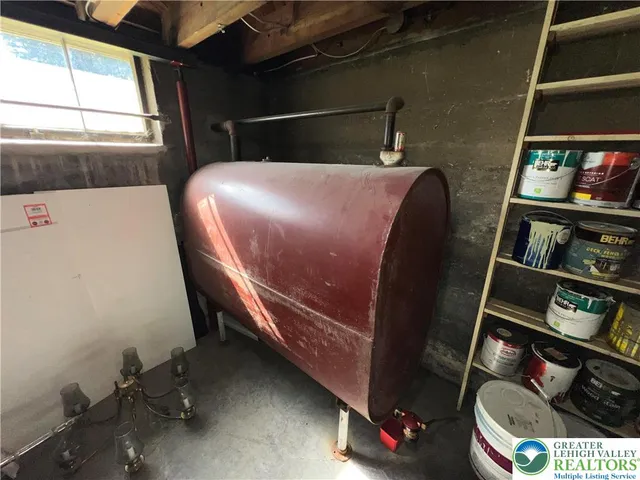 a view of a house with wooden fence