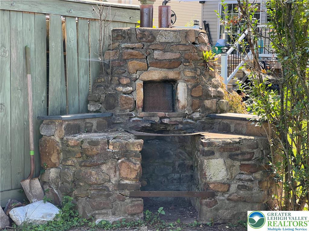 135 West Wabash Street Allentown, PA 18103 - Photo 60 of 69 a brick building with a bench