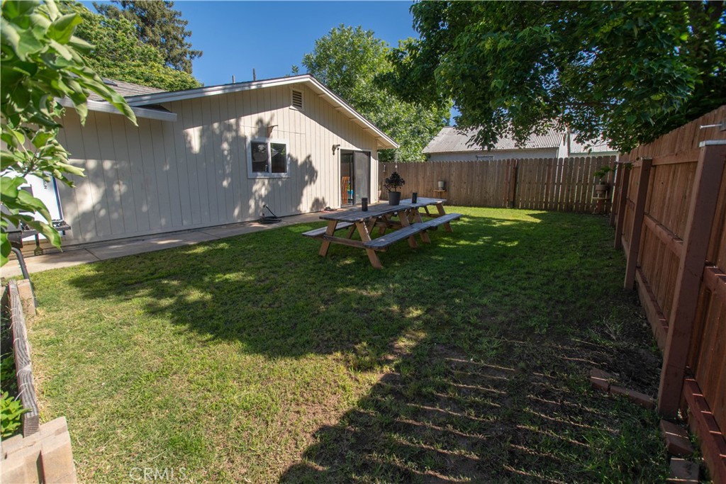 1 San Ramon Drive Chico, CA 95973 - Photo 32 of 42 a front view of a house with yard and green space