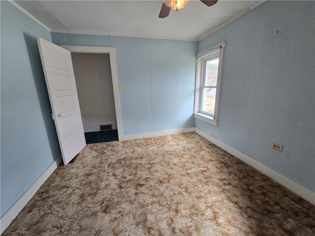 175 Walcott Street Clymer, PA 15728 - Photo 22 of 24 a view of empty room with window