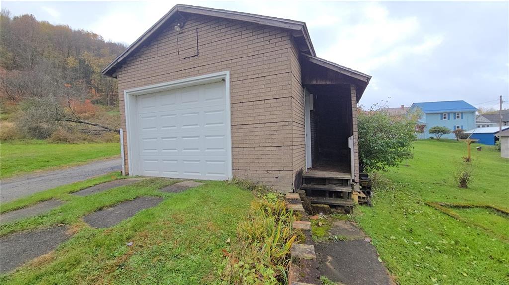 175 Walcott Street Clymer, PA 15728 - Photo 5 of 24 a front view of a house with a yard
