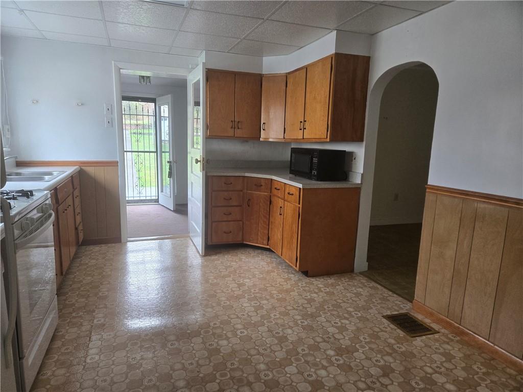 175 Walcott Street Clymer, PA 15728 - Photo 8 of 24 a kitchen with refrigerator and window