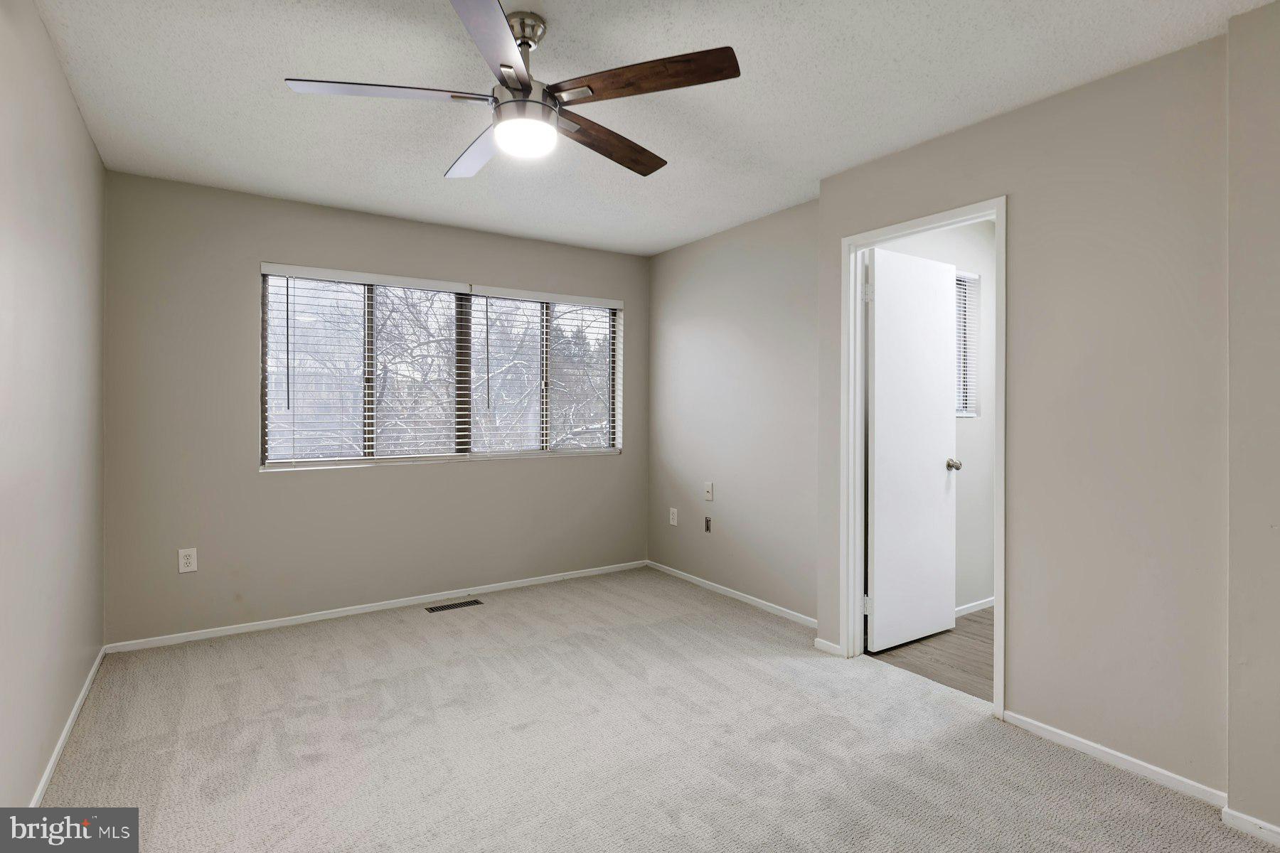 2105 Old Landing Way Woodbridge, VA 22191 - Photo 18 of 30 a view of an empty room with a window