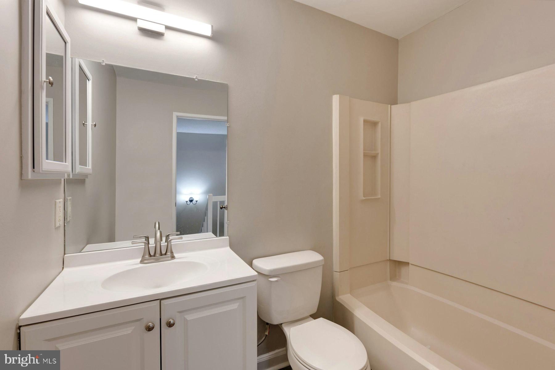 2105 Old Landing Way Woodbridge, VA 22191 - Photo 23 of 30 a bathroom with a sink toilet and shower