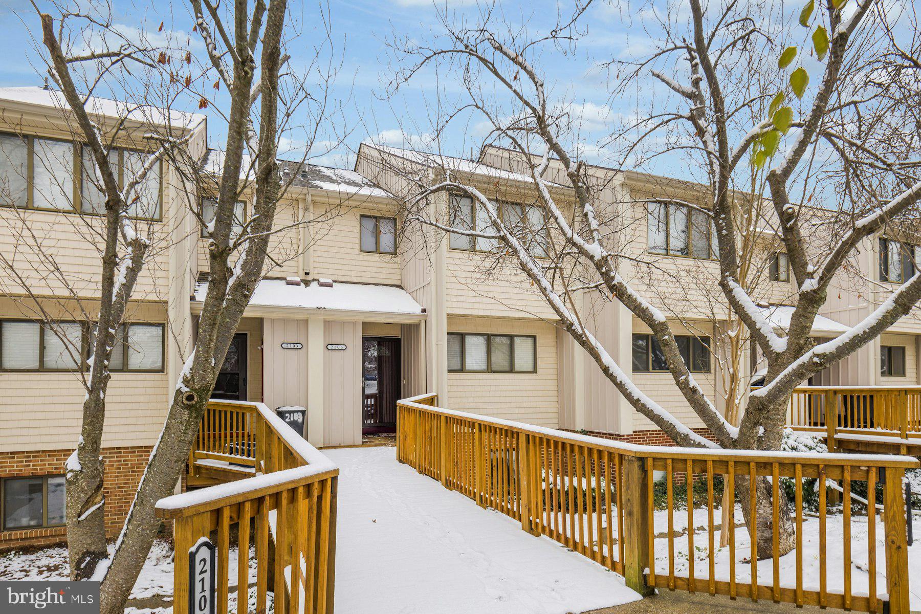 2105 Old Landing Way Woodbridge, VA 22191 - Photo 3 of 30 a view of a large white house with large trees