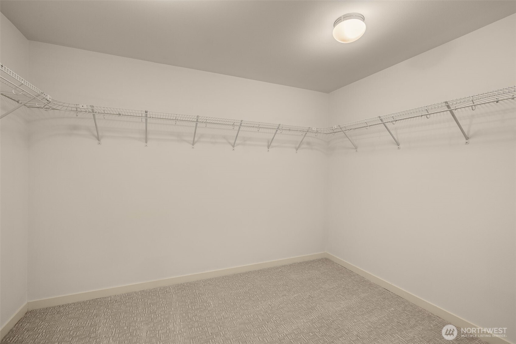 24 174th Place Southwest Bothell, WA 98012 - Photo 16 of 33 a view of a room with racks on the wall