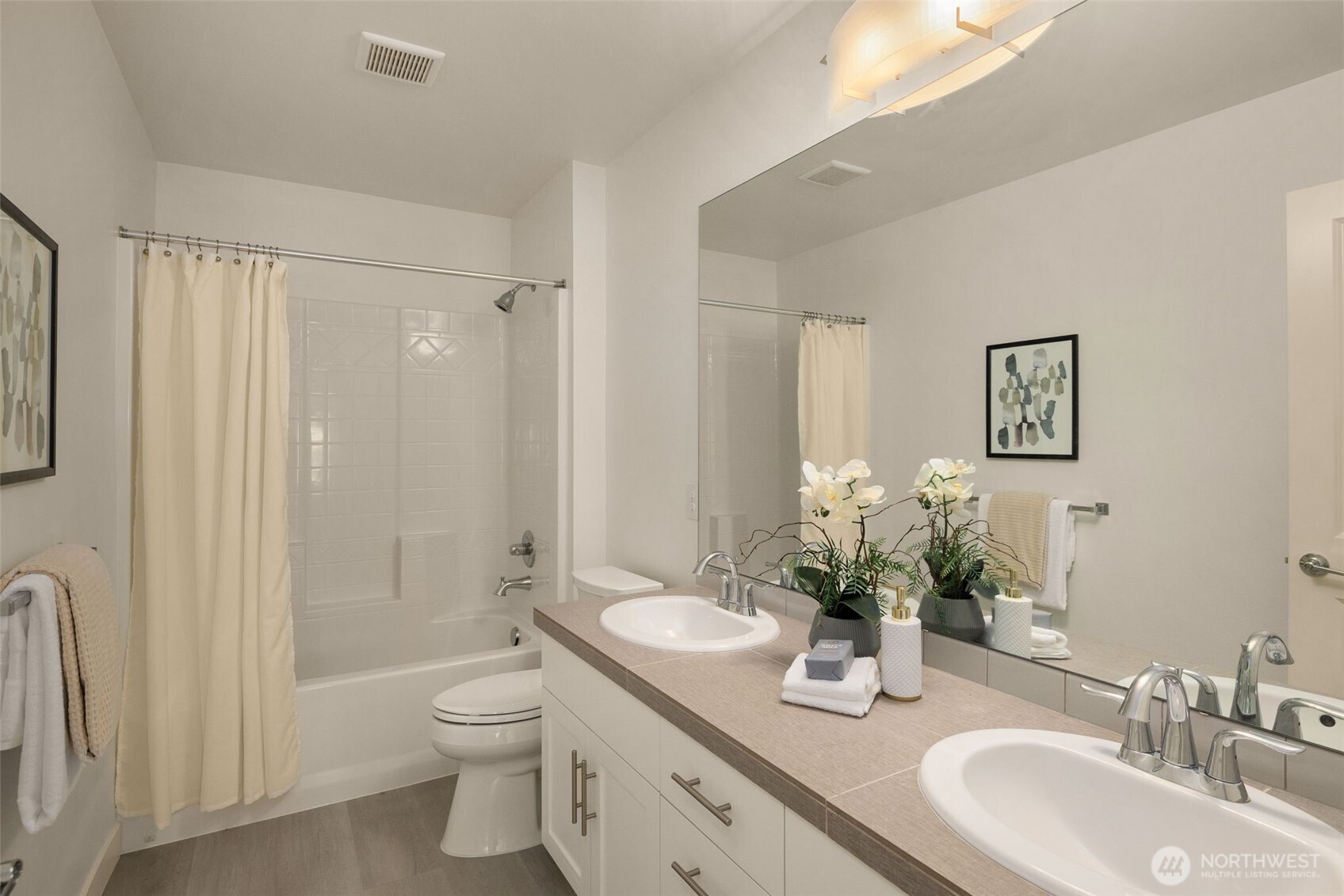 24 174th Place Southwest Bothell, WA 98012 - Photo 18 of 33 a bathroom with a granite countertop sink toilet and shower