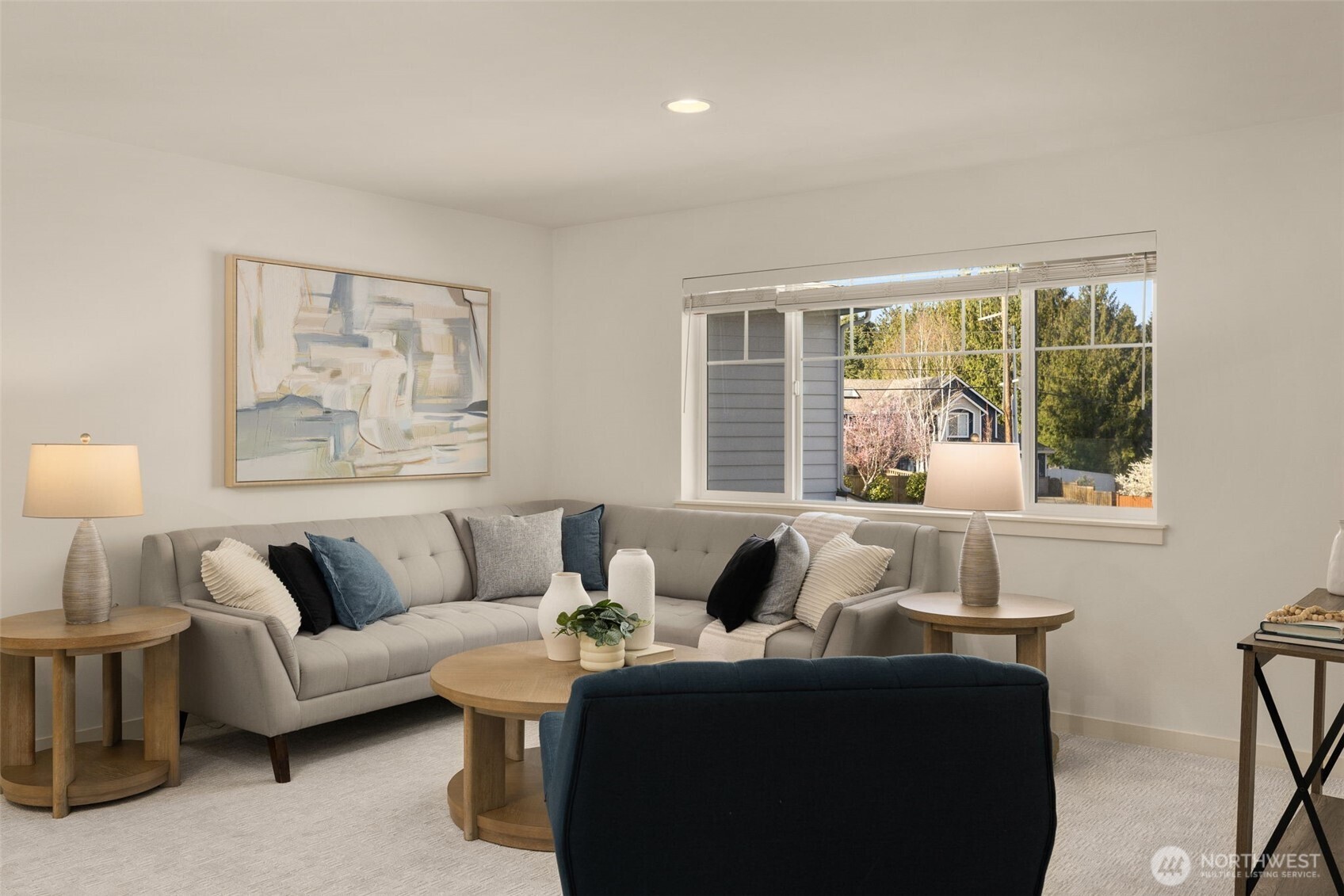24 174th Place Southwest Bothell, WA 98012 - Photo 20 of 33 a living room with furniture and a large window