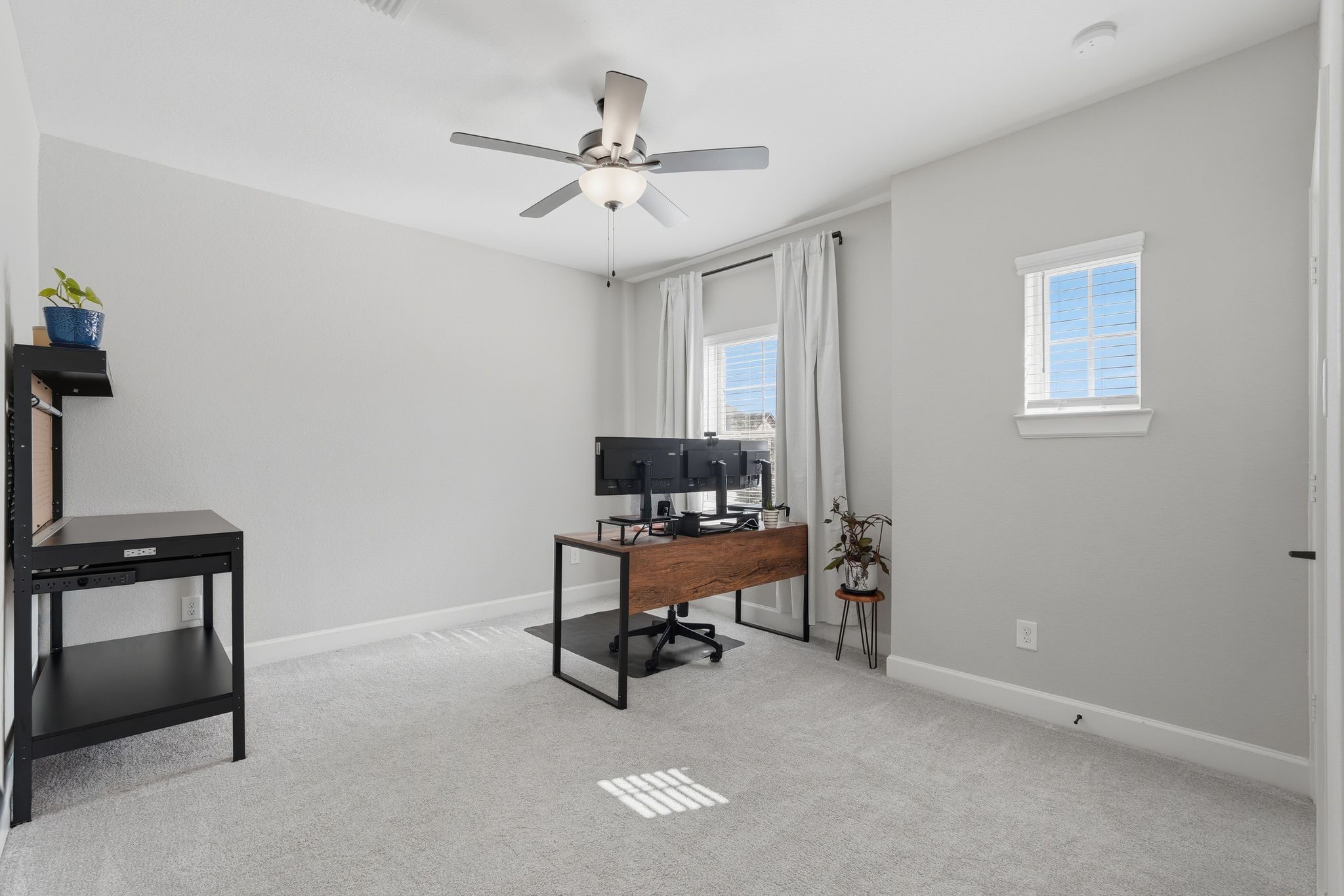 24423 Morningside Terrace Tomball, TX 77375 - Photo 20 of 47 a view of a workspace with furniture and a window