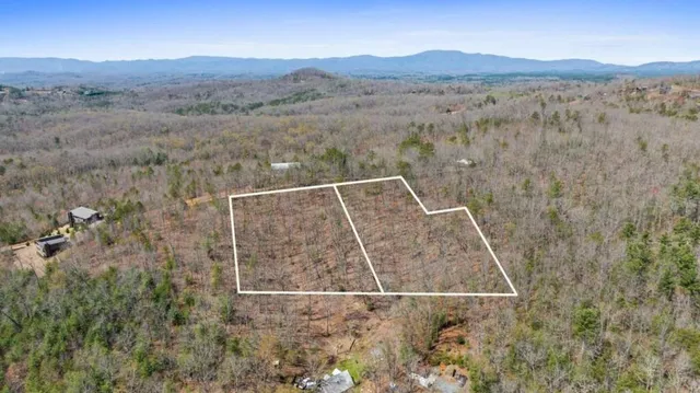 a view of a mountain from a yard