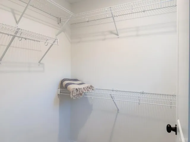 a bathroom with a sink a toilet and a shower