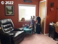 1267 Tucker Road, Unit 8 Hood River, OR 97031 - Photo 13 of 21 a living room with furniture and a window