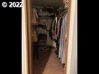 1267 Tucker Road, Unit 8 Hood River, OR 97031 - Photo 18 of 21 a view of walk in closet with clothes and shoes