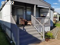 1267 Tucker Road, Unit 8 Hood River, OR 97031 - Photo 2 of 21 a view of balcony with wooden floor