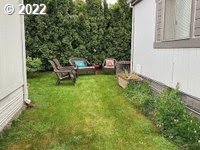 1267 Tucker Road, Unit 8 Hood River, OR 97031 - Photo 4 of 21 a view of a backyard with sitting area