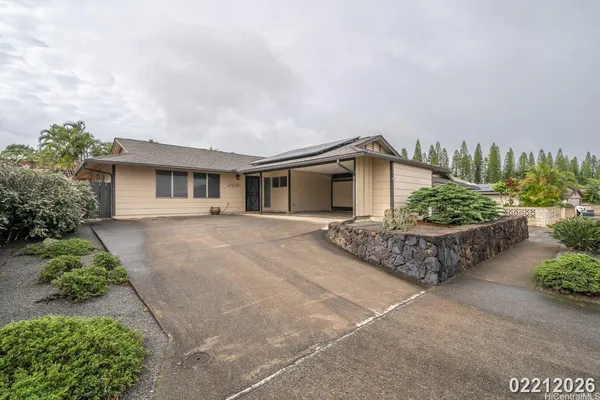 a house with trees in front of it