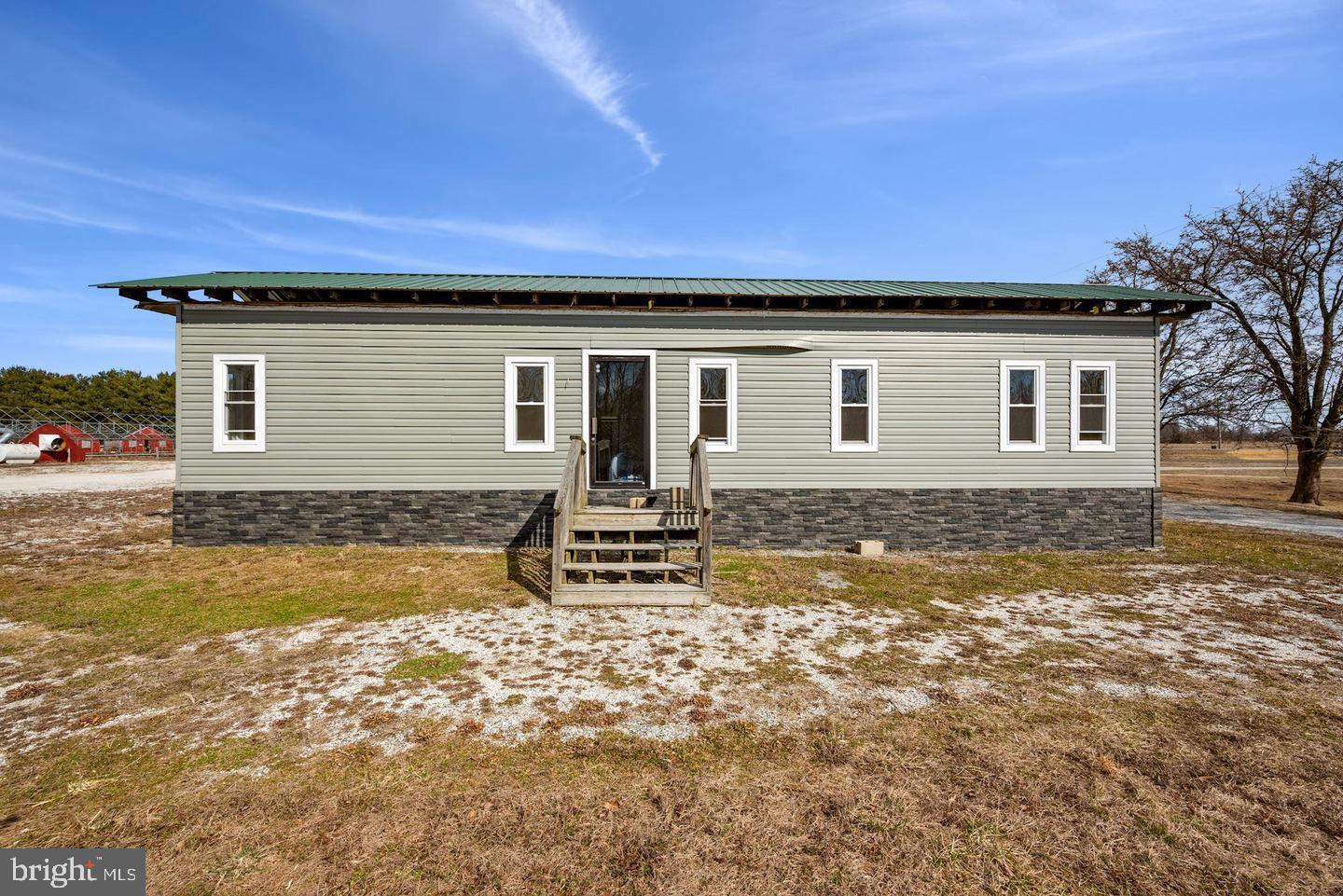 601 Quinton-Marlboro Road Bridgeton, NJ 08302 - Photo 11 of 17 a front view of a house with a yard