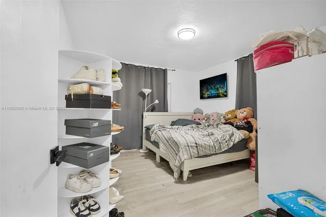 a kitchen with stainless steel appliances granite countertop a stove and a microwave