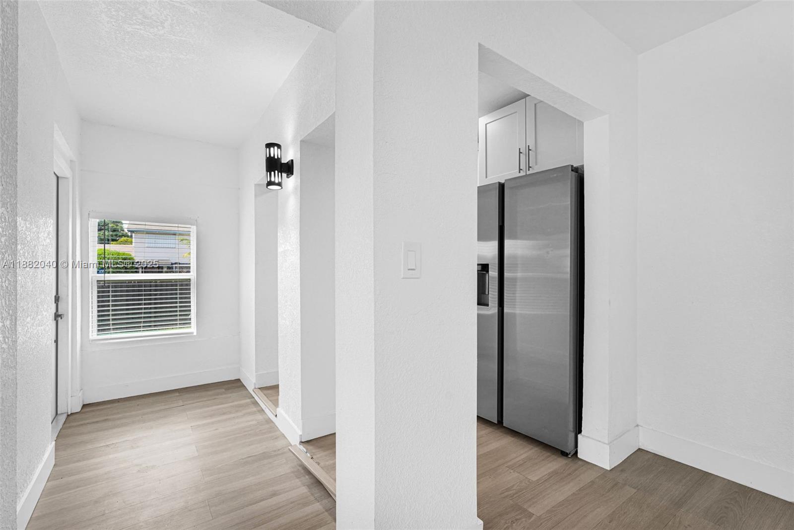 1090 Northwest 77th Street Miami, FL 33150 - Photo 66 of 77 an empty room with windows and closet