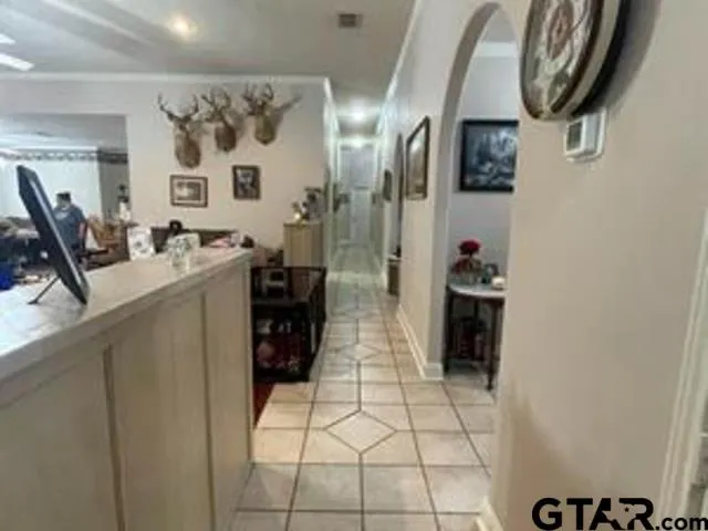 a kitchen with stainless steel appliances a refrigerator and cabinets