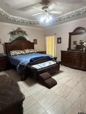 a large bathroom with a double vanity sink mirror and toilet