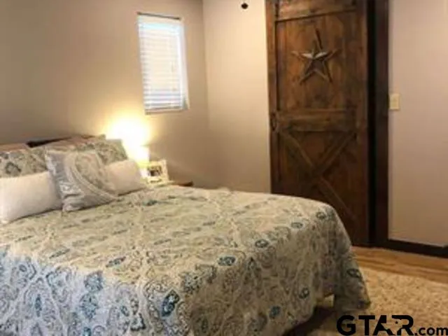 a bathroom with a bath tub and a shower