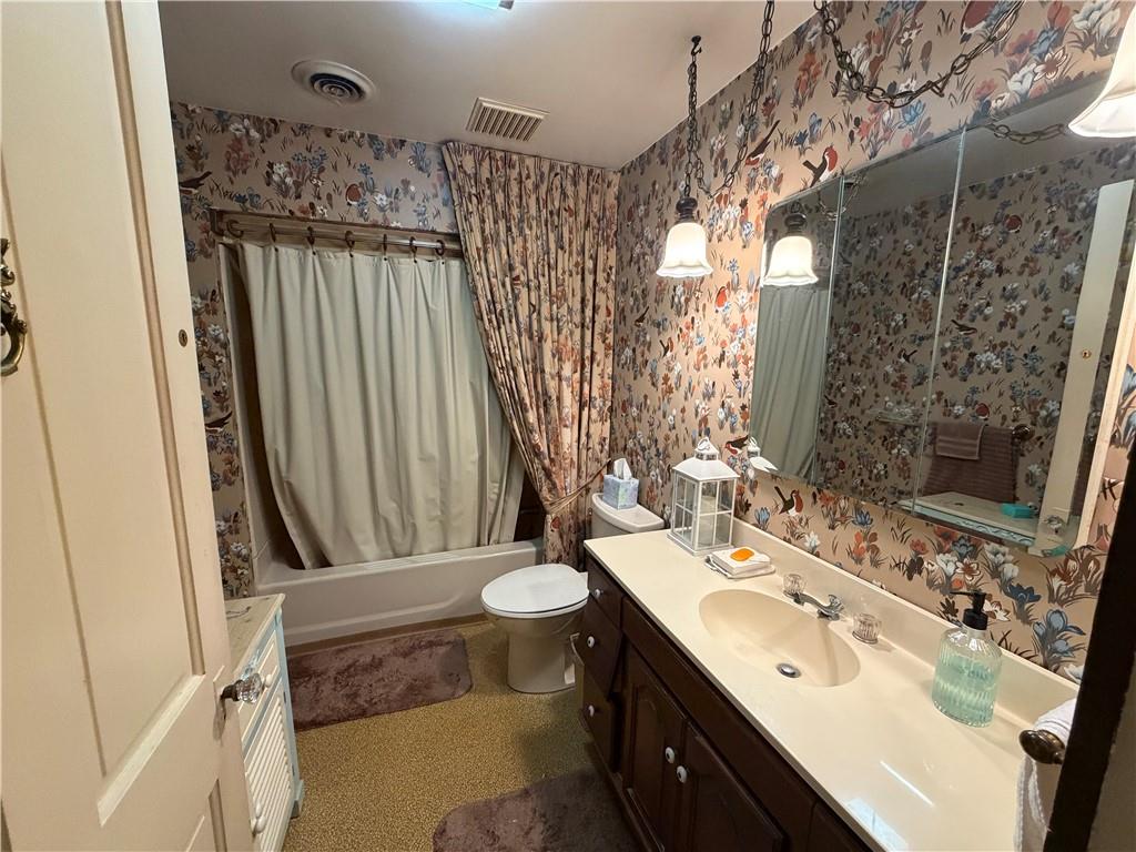 149 Chess Street Monongahela, PA 15063 - Photo 16 of 35 a bathroom with a double vanity sink mirror and shower