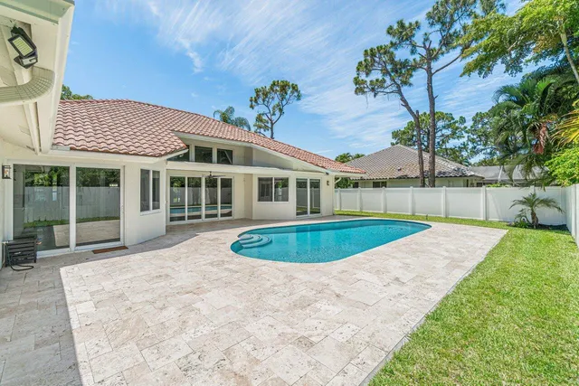 a view of outdoor space yard and swimming pool