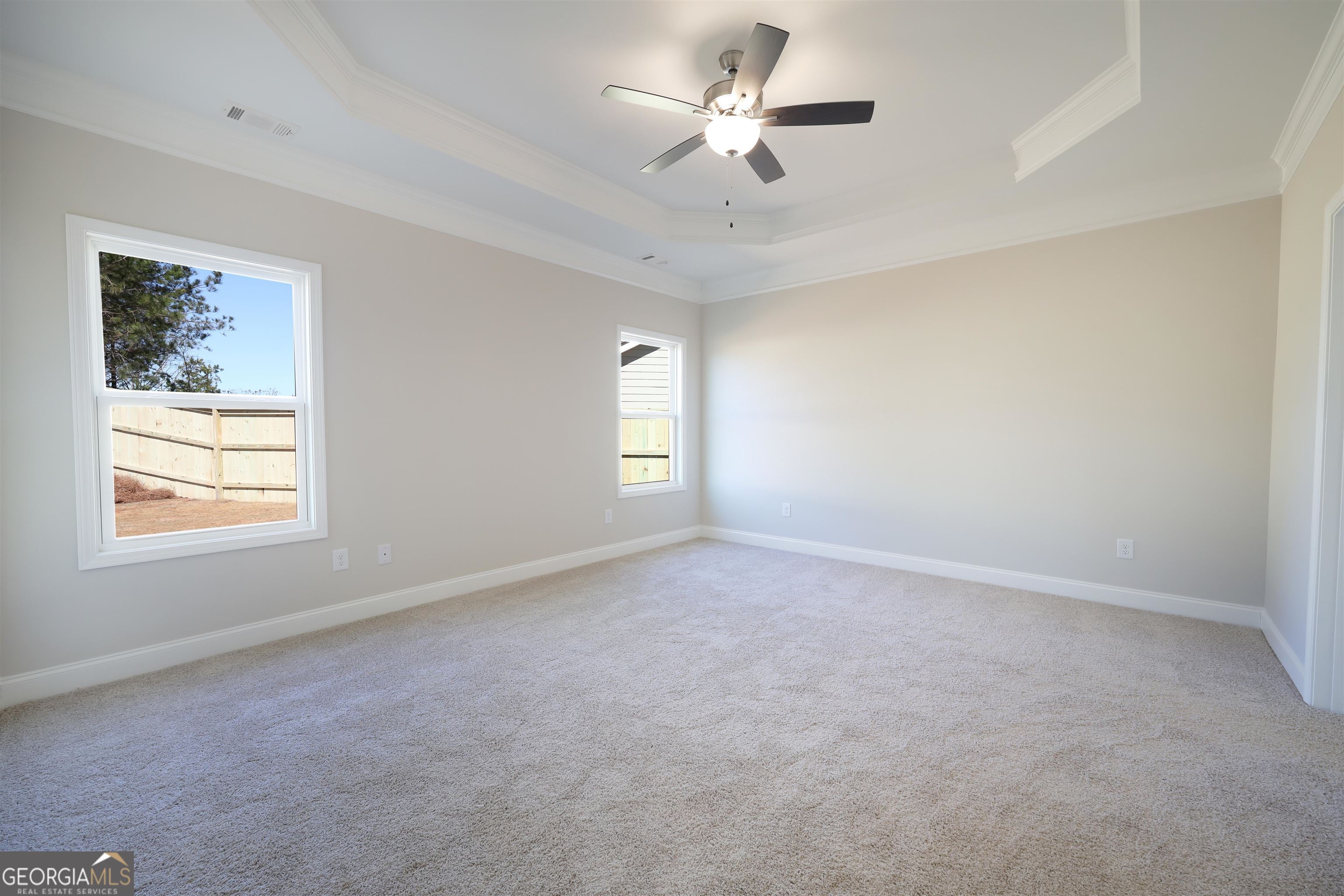 63 Delightful Way, Unit 1 Winder, GA 30680 - Photo 12 of 26 a view of an empty room with a window