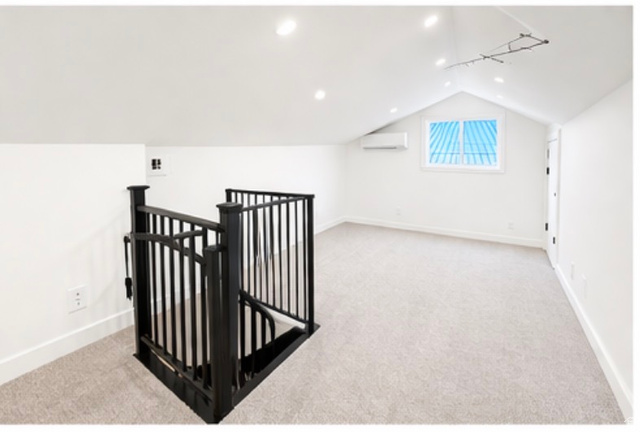 266 700 West Provo, UT 84601 - Photo 14 of 18 Additional living space with light colored carpet and recessed lighting