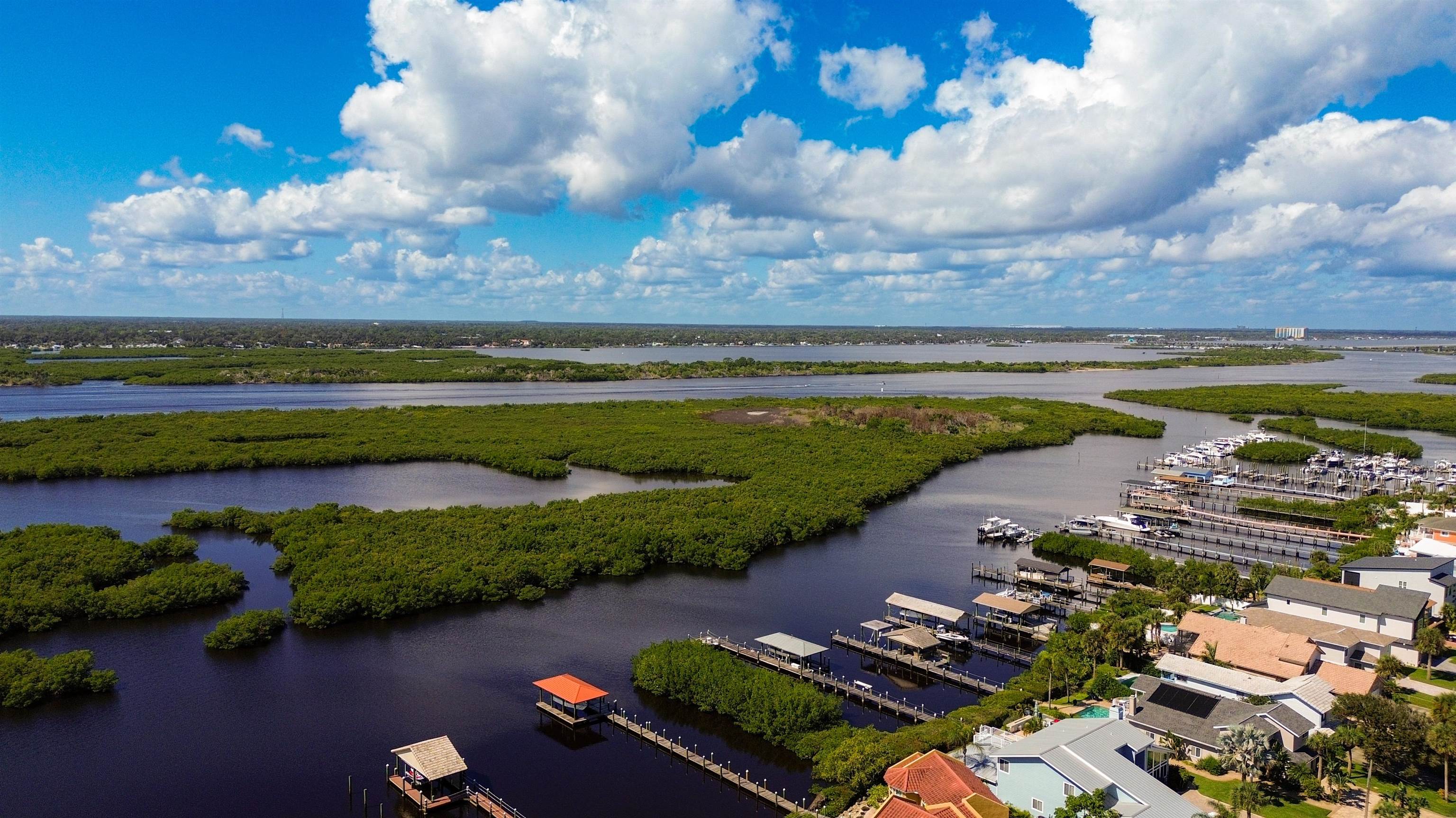 4738 South Atlantic Avenue Ponce Inlet, FL 32127 - Photo 16 of 32 a view of a lake with outdoor space