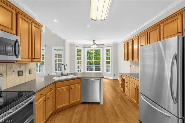 $649,000 | 8241 William Wallace Drive, Summerfield, NC 27358