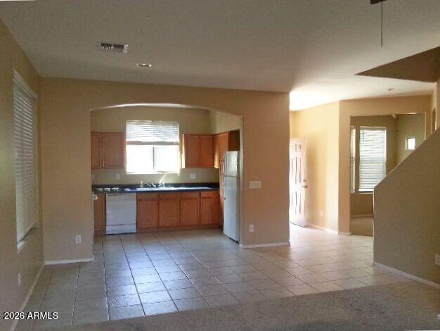 1939 East Emily Lane Gilbert, AZ 85295 - Photo 2 of 9 a large kitchen with a sink and a large window